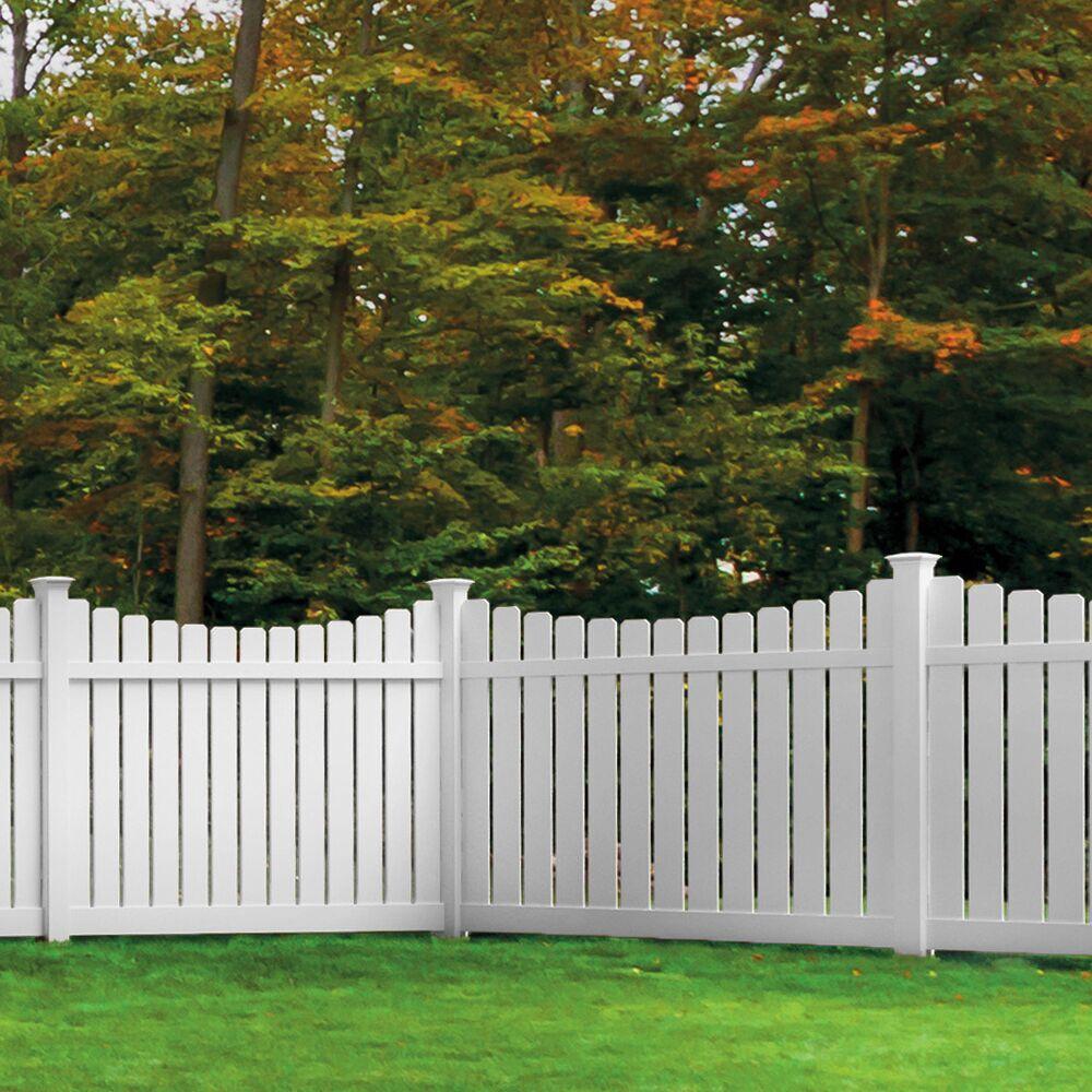 White vinyl privacy fence along a residential property line