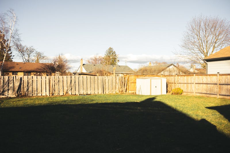Freshly installed fence boards ready for the next Kansas season