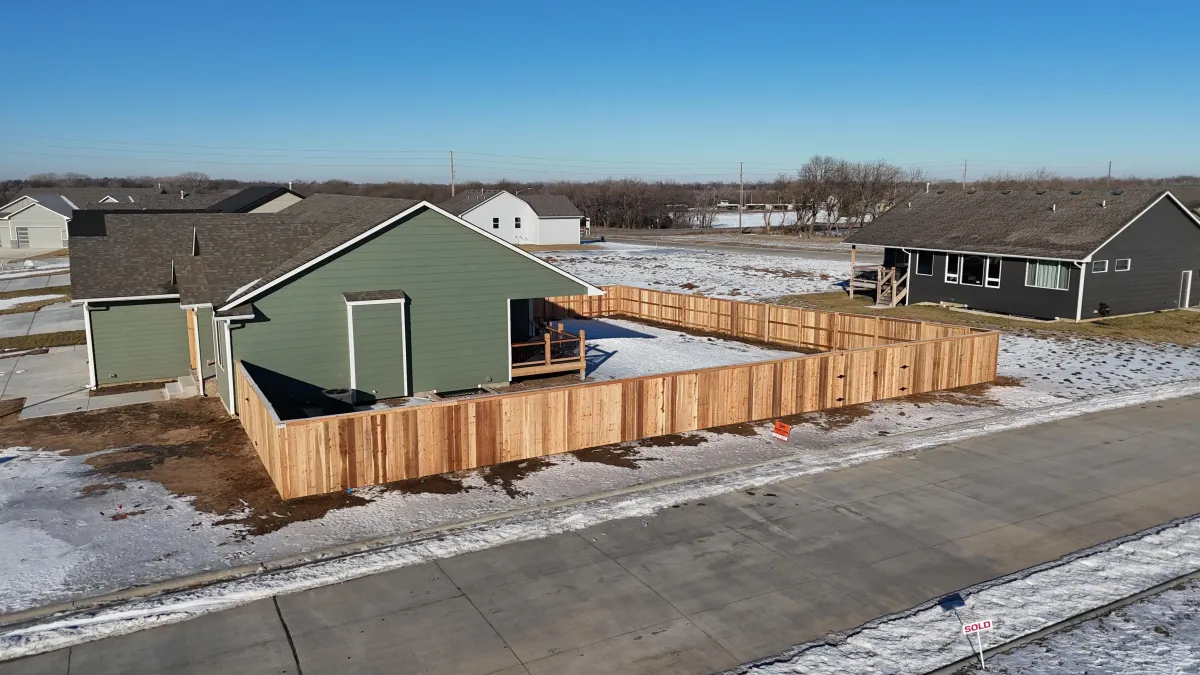 Aerial view of a wood privacy fence installation in Wichita