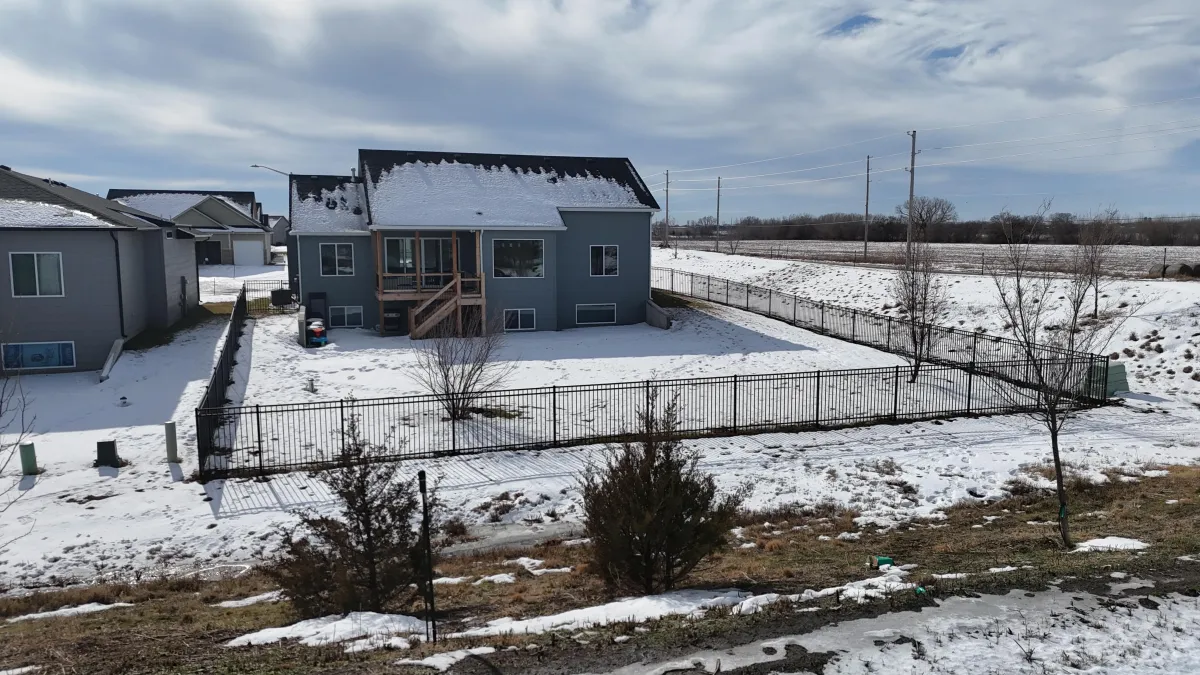 Fence and deck staining completed by Midwest Fence in the Wichita area
