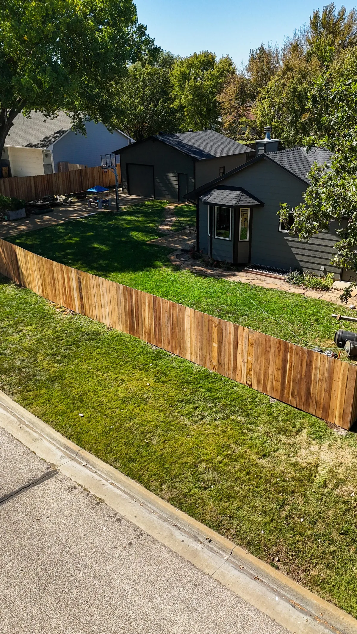 Midwest Fence crew completing a residential fence project
